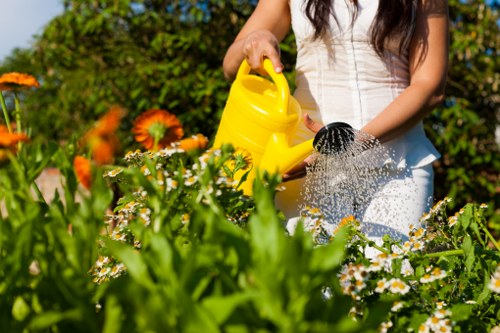 Volunteers and charity partners collecting donated plants and materials